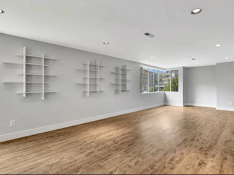 Downstairs bonus room! Second living area, large home office, recreation room, studio, very versatile