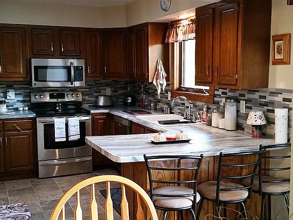 S S appliances tile backsplash