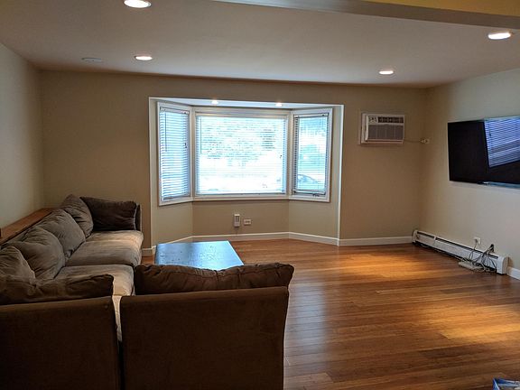 Living Room - picturing the AC unit and TV that will be available