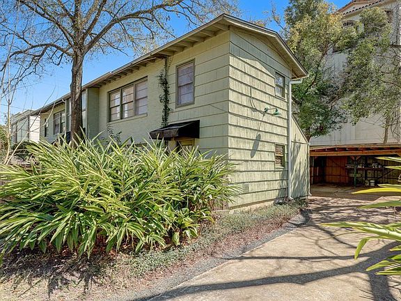 Beautiful landscaping and covered, off-street parking.