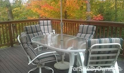 Back Deck
						:
						Beautiful mahogany deck (vs pressed wood) overlooks private wooded area/backyard