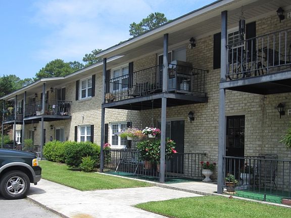 Apartment Outside Building Showing Private Patio