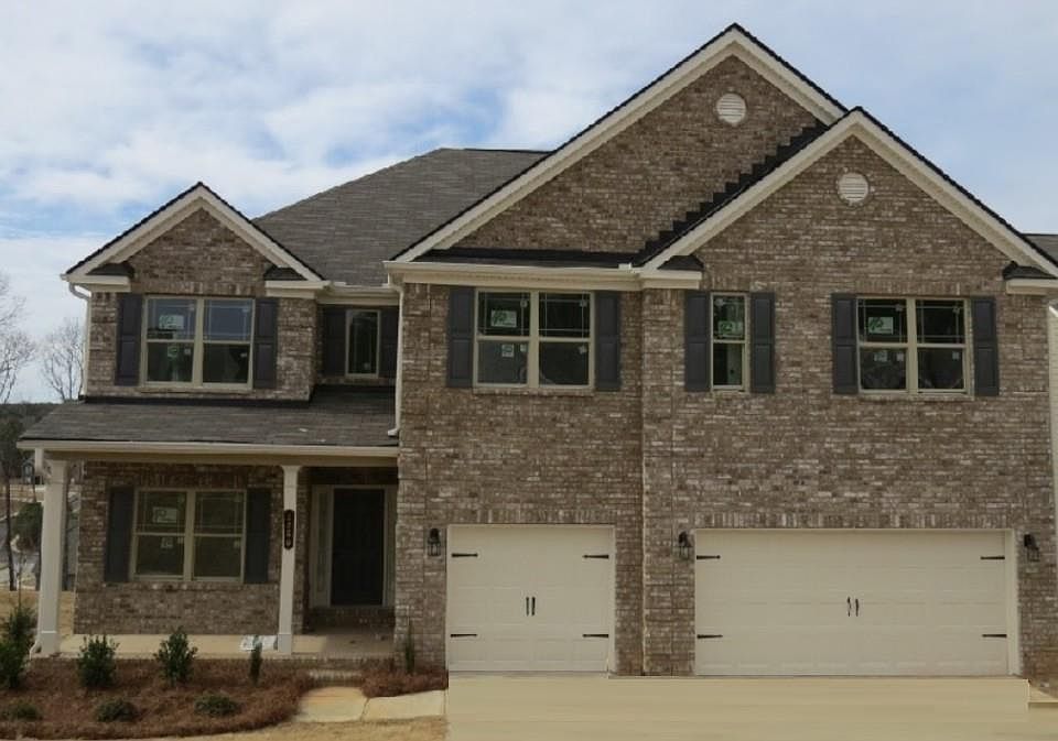 2-story Foyer leading to Study and Dining Room with coffered ceiling. Chef's Kitchen with granite counters, pantry, island, Breakfast Room and full view to the Great Room with fireplace. Private guest suite with full bathroom. Upstairs is the Master Suite