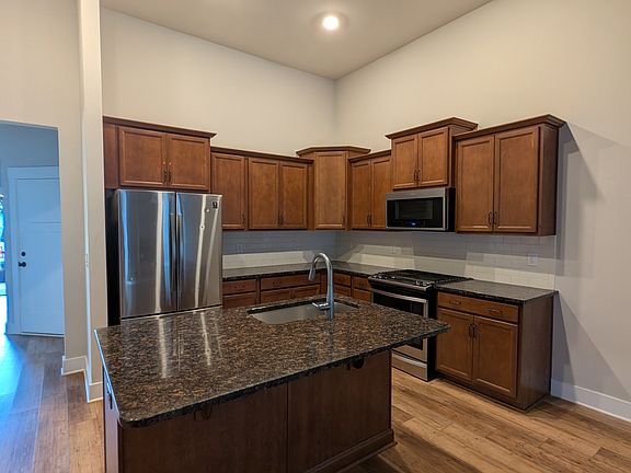 Kitchen with all stainless stain high end appliances.
