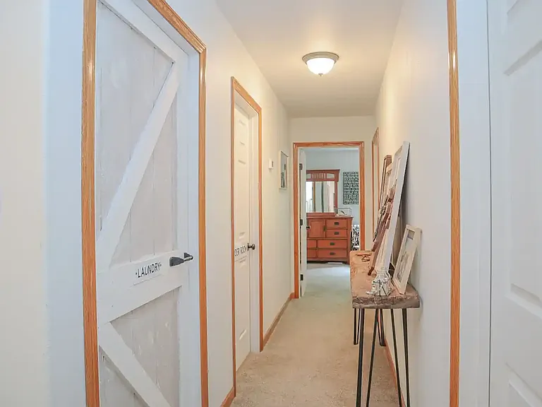 Upstairs hall with laundry room