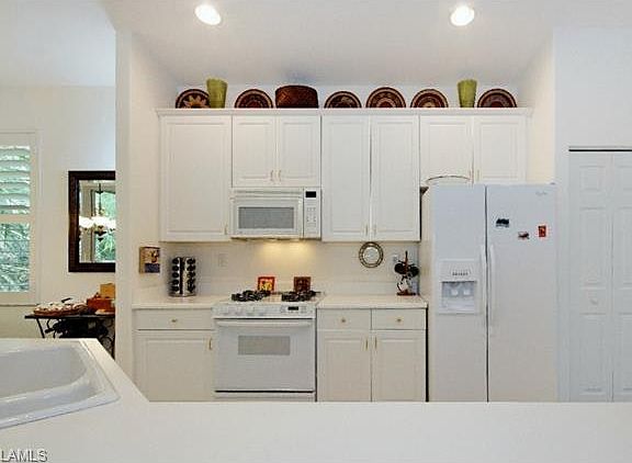 4th image of 1720 Tarpon Bay Dr S APT 203