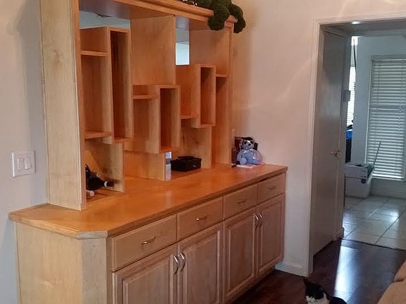 Custom cabinet between dining room and living room
