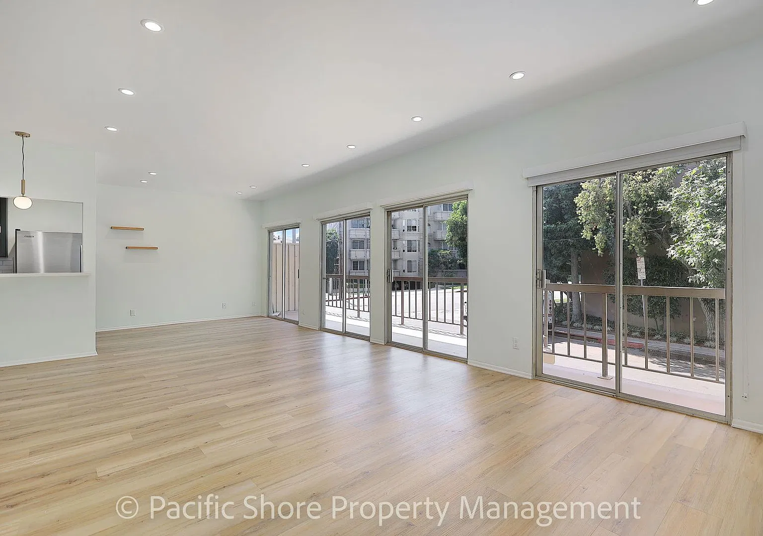 Stunning Remodeled 2-Bedroom Condo in Brentwood with Private Balcony & Pool! — Photo 2