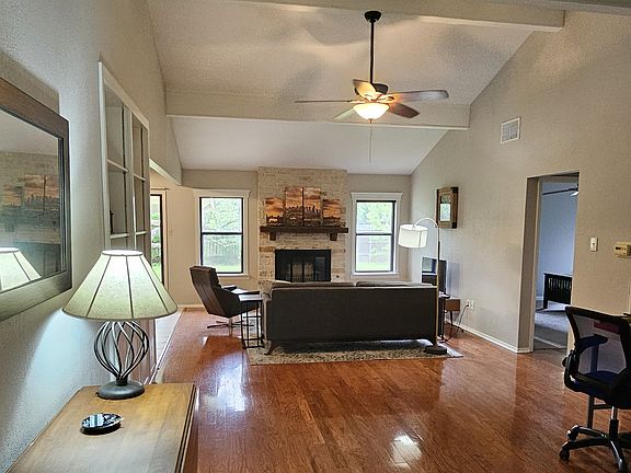 Front Entry opens to a large living room with beautiful hardwoods.