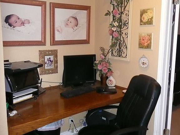 Study with built in desk and entertainment center