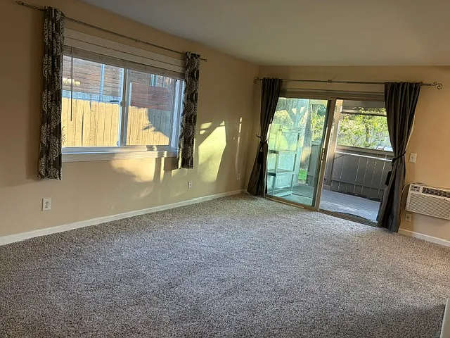 Large living room. New carpet. Privacy from all viewsheds.