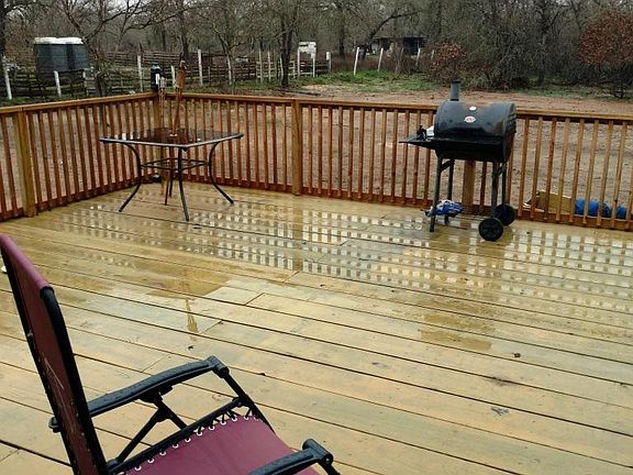Left side of the large deck out the patio doors.