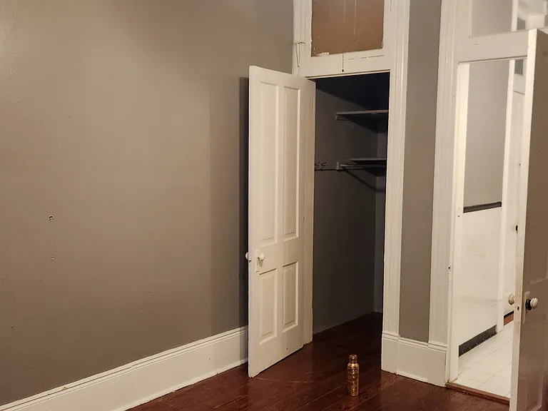 Bedroom 2. Big (tall and deep) closet and door into bathroom.