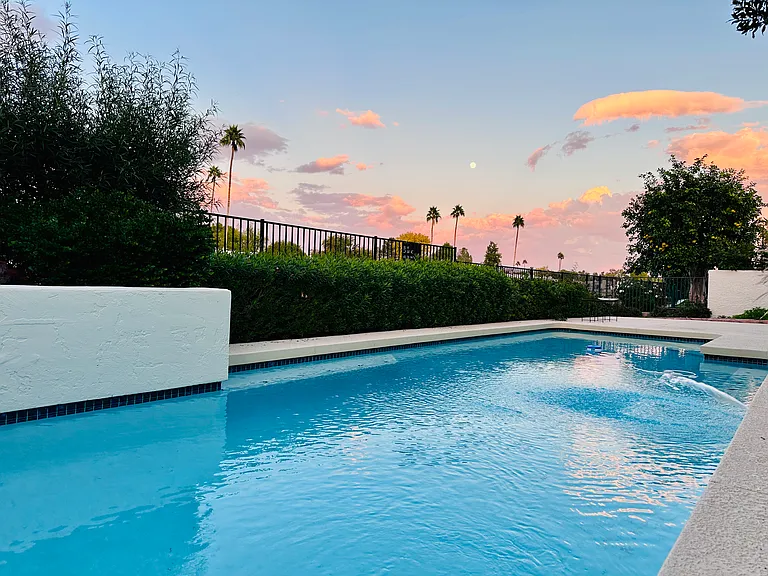 Backyard of the house with swimming pool.