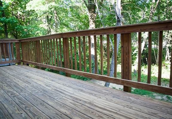 Deck spans townhouse, Huntley Meadows land behind