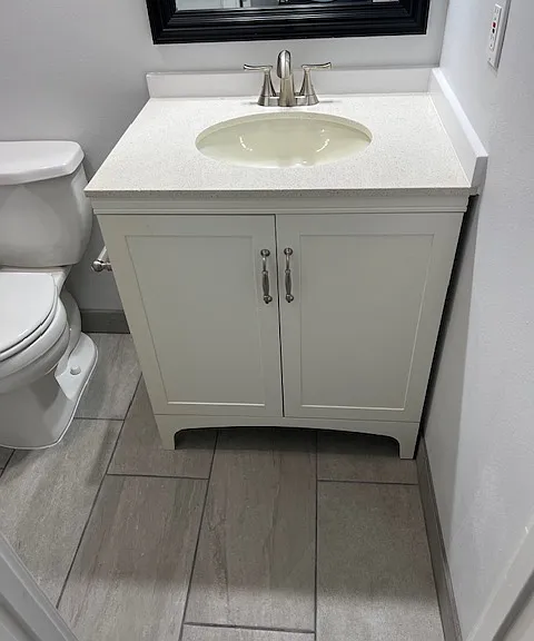 Second Floor 3/4 Master Bathroom: Vanity, Countertop, Backsplash, Sink, Faucet, Mirror, Toilet, New Toilet Seat, Exhaust Fan with Light, New Tile Baseboard and Grout Flooring.