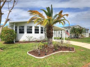 902 Periwinkle Cir, Barefoot Bay, FL 32976