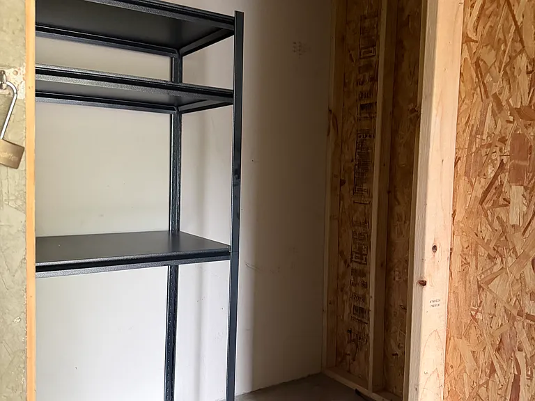 right inside of private secured storage unit, approx 6 x 10 for bikes, bins and outdoor equipment