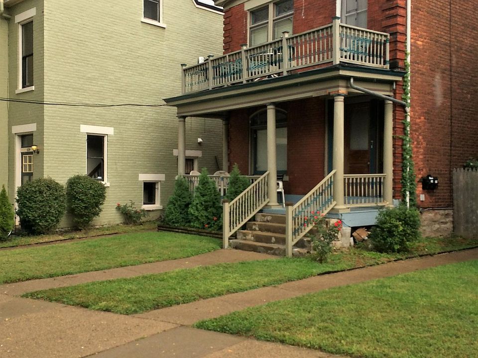 Exterior of building.  Walkway to rear on right side of buil