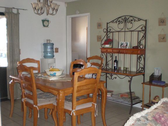 Dining room with sliding door view of large back yard
