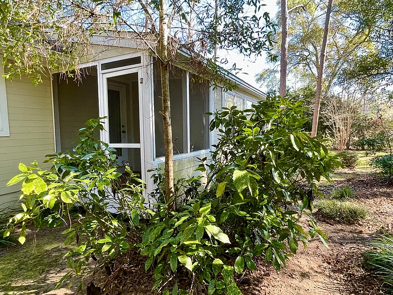 The bonus screened patio is totally private.