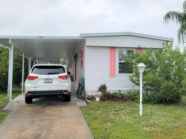 703 Periwinkle Cir, Barefoot Bay, FL 32976