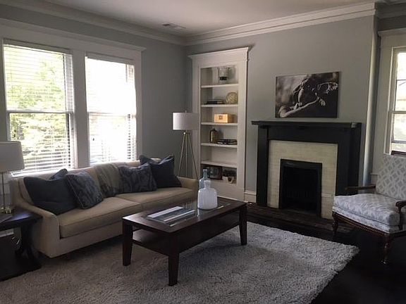 Beautifully appointed spacious living room with 10 ft ceilin