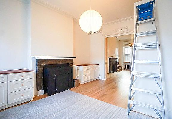 3rd image of 115 E 2nd St APT 2