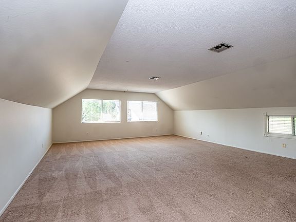 Huge bonus room or you can make this room a master suite.