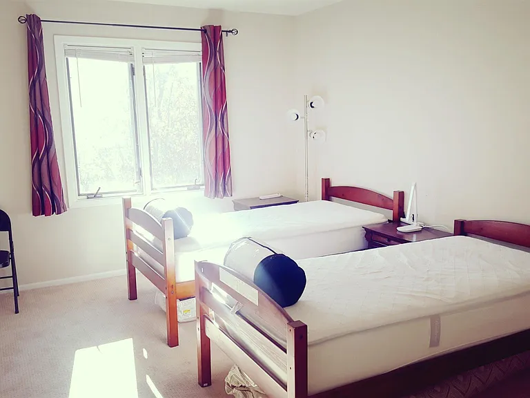 Master Bedroom Equipped with Two Twin Cots & Beautyrest Mattresses