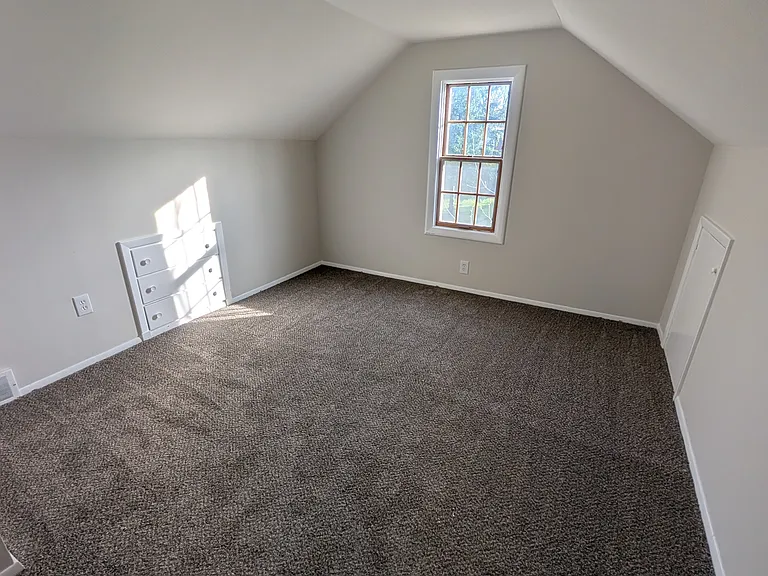 Bedroom 4 located on the 2nd floor with new LED lights and fresh carpet