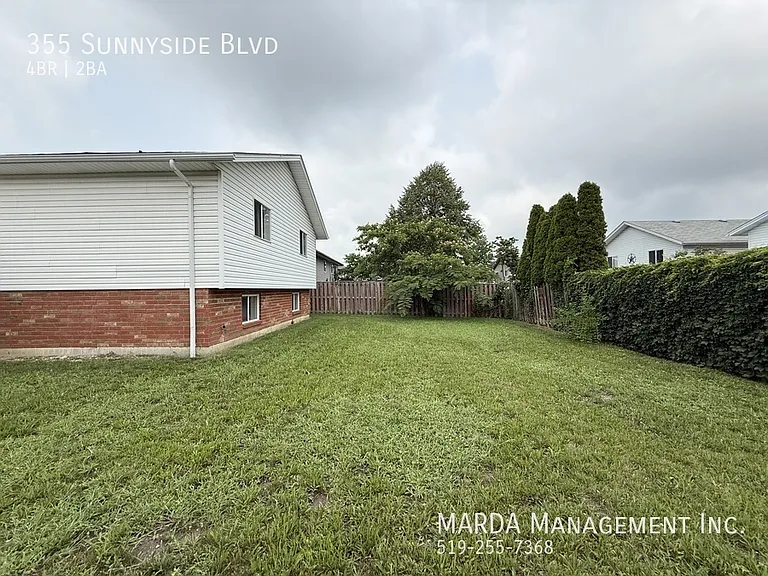 355 Sunnyside Blvd — Photo 60