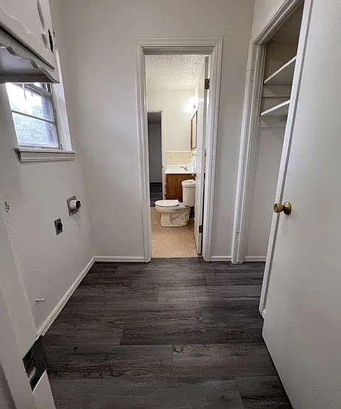 Laundry off entry and bedroom one.