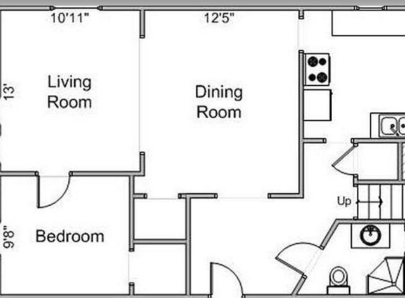 Floor plan of lower floor does not include 3 bedrooms on upper floor.