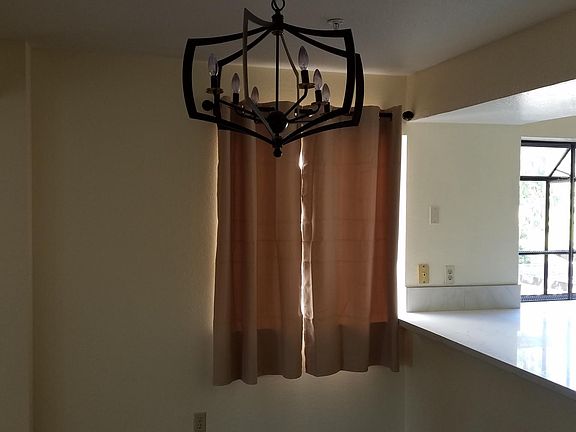 Dining area between kitchen and living room