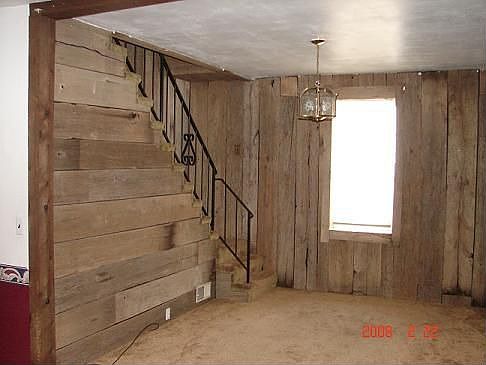 Living room w/barn wood wall