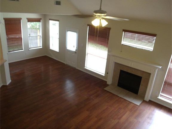 Large living room with beautiful fire place