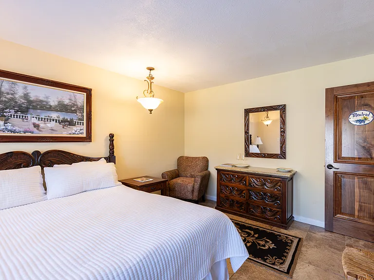 A cozy space designed for restful nights and lazy mornings.