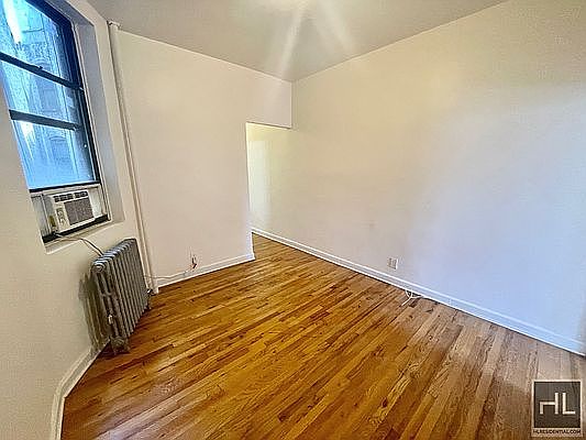 5th image of 331 E 14th St APT 4