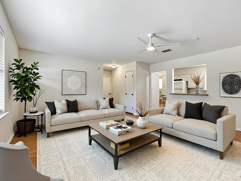 Staged living room- light paint and nice LVP floors- no carpet