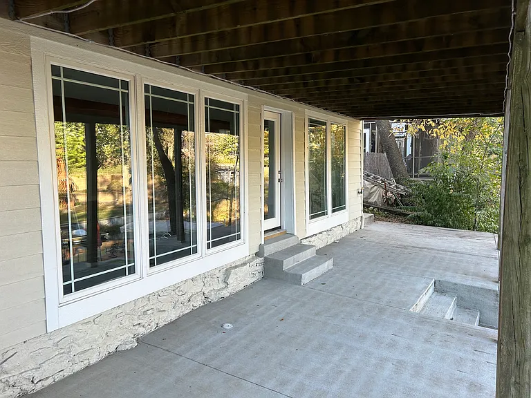 Lower level patio with lake views.