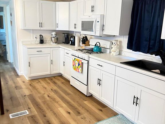 4th image of 14809 Michigan St Lot 60-23
