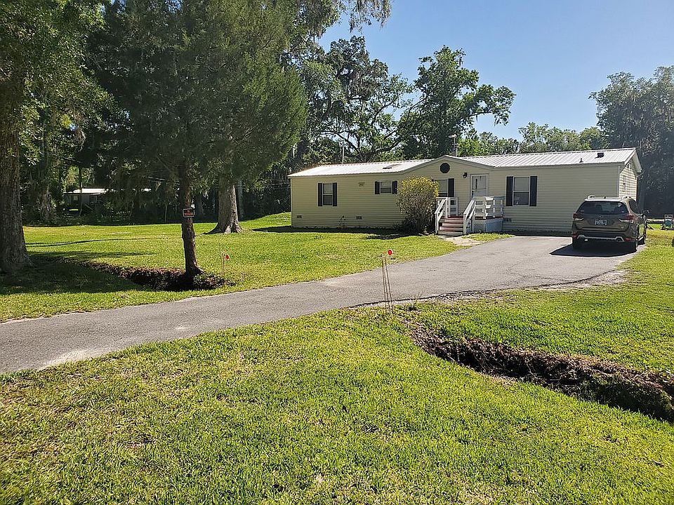 Paved Driveway & Metal Roof