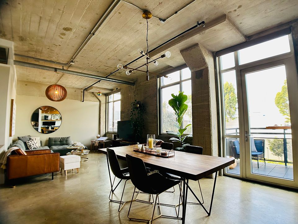 Floor to ceiling windows and open concept living