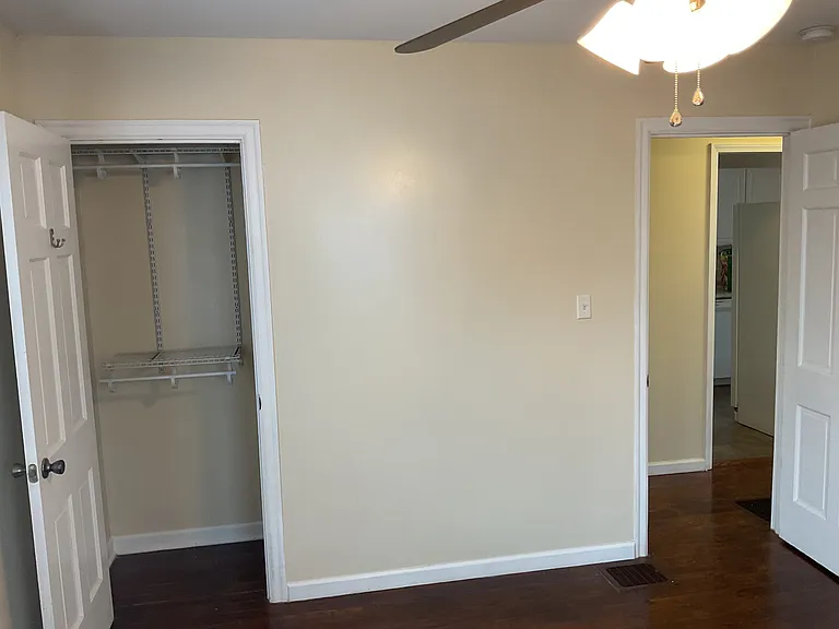 Main Floor Bedroom has new Closet Organizer to maximize clothes storage.