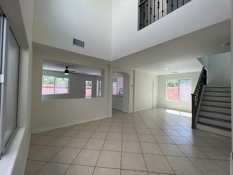 The front entrance leads into the living room and dining area.