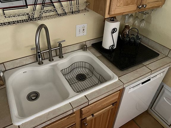 dishwasher or drying rack for hand washed dishes.
