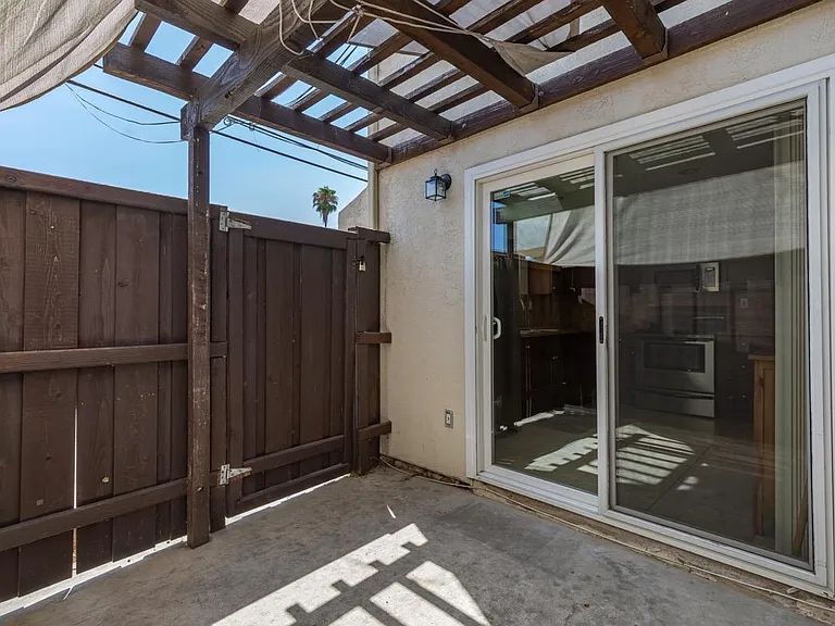 Access to private patio through Kitchen.