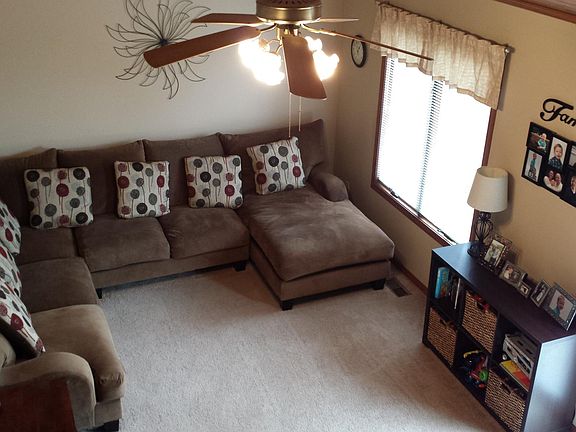 12x20 Family Room with vaulted, wood beamed ceiling. Access to deck
