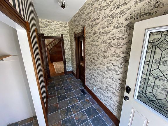 Entry way, coat closet on the left